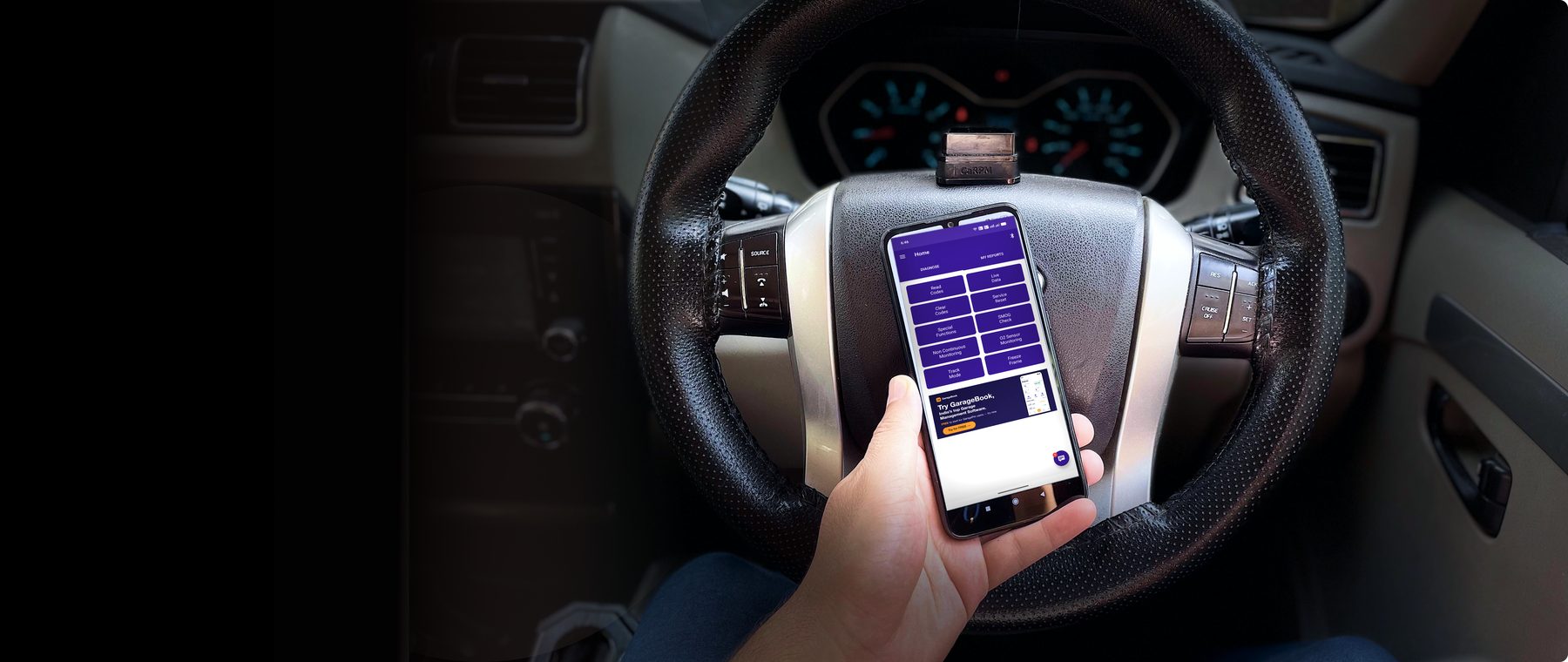 The GaragePro scanner plugged into a car's OBD port, with the app open on a phone